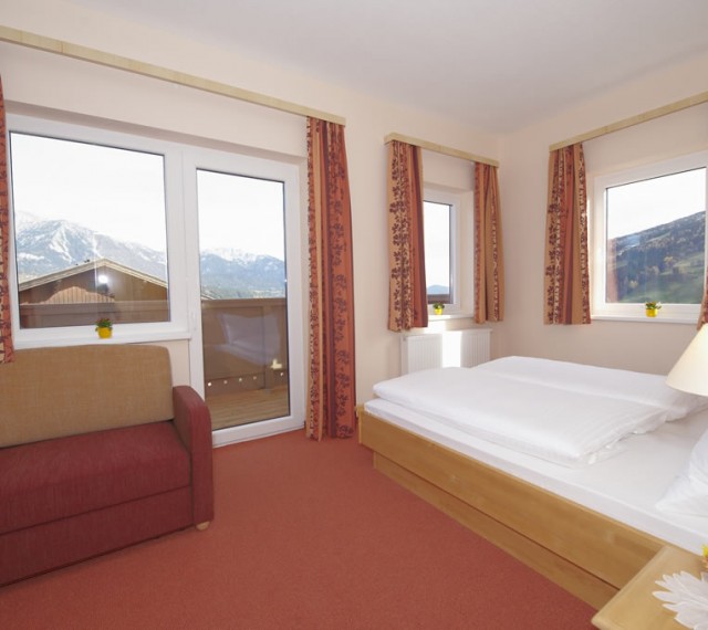 Unsere gemütlich eingerichteten Zimmer mit Blick auf die traumhafte Bergwelt